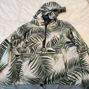 Leaf print, lightweight pullover with hood and zipper and pocket. Size M.